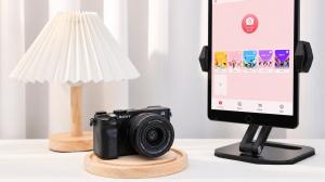 Sony a7C mirrorless camera next to an iPad running the ChackTok photo booth app
