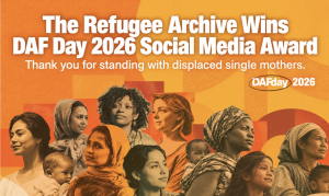 Multi-cultural women pictured in a group with the announcement of the award won by The Refugee Archive.