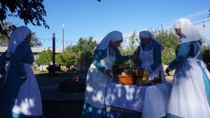 four sisters setting up the altar near the fire circle for the moon ceremony