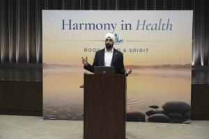 Dr. Kunwarjeet Singh Duggal presents the first Harmony in Health talk at the SOS Meditation Center in Lisle, part of a free three-talk series exploring body, mind, and spirit.