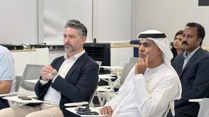 Mario Schiano Lo Moriello, Chief Executive Officer of CASABOT and Mr Ali Al Mazroei, Chief Executive Officer of the Bahri & Mazroei Group listening to their teams presentation