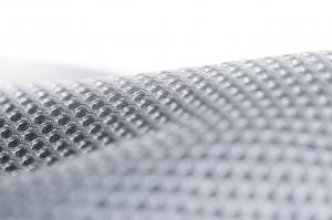 Macro close-up of grey Wintex mesh fabric showing the breathable woven texture used on the VATALLA BIRCH ergonomic chair.