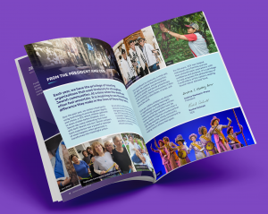 Image of JCF's Impact Report open and flipping through.