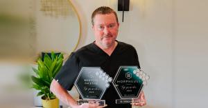 Cosmetic surgeon Dr. Patrick Blatchford of BelleSculpt Oklahoma in Oklahoma City and Tulsa holding his 2025 InMode BodyTite FaceTite and Morpheus8 Top Provider awards