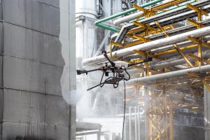 Industrial facade before and after cleaning by the C30 drone