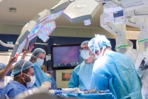 KFSH surgeons and nurses performing a procedure in an operating room in Riyadh
