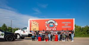 Power Movers Team with their moving truck in the back