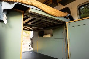 Timber Van Kits Wheel Well Cabinet and Bed System in Slate Green