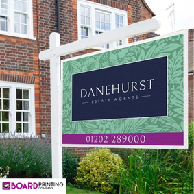Estate agent board displaying a property for sale with agent details