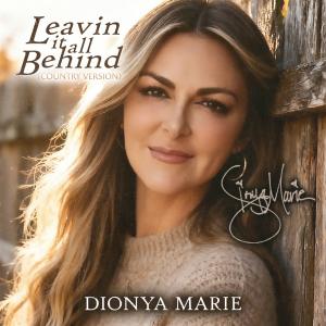 picture of Dionya Marie leaning against wooden fence