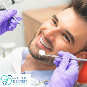 Dentist examining a patient's teeth during a dental appointment