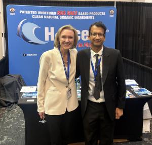 Dr. Rajiv Saini, H2Ocean Chief Scientific Officer, with Kristen Doyle, CPRIT CEO, at the H2Ocean booth during the CPRIT Cancer Conference 2026.