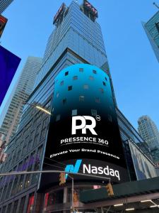 PRessence 360 logo and branding displayed on the curved Nasdaq billboard in Times Square, New York City.