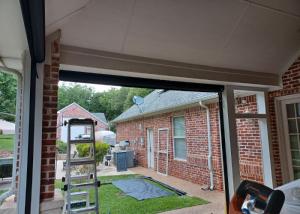 working on motorized screen and awning installation