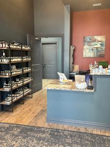 Reception desk and professional supplement shelves at Elite Wellness in Tyler, Texas