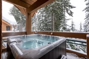 Five-bedroom Whistler vacation rental at Northern Lights in Whistler Village with a private hot tub, booked direct with Aloha Whistler.