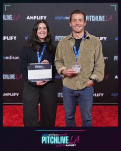 Alena Tuttle of Hardline and Ben Parens of Nestwell, joint winners of PitchLive.LA 2026, standing together on the red carpet.