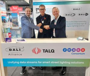 Three spokesman of the DALI Alliance, the TALQ Consortium and the Zhaga Consortium shake hands