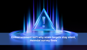 Glowing blue warning triangle with an exclamation mark above the text "Embarrassment isn't why scam targets stay silent"