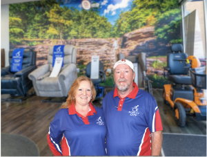 Photo of Joe and Jenifer Stewart in their new Springfield MO showroom. They are the first couple multi-location owners of Mobility City franchises