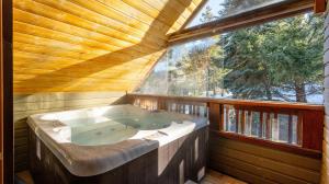 Cedar Hollow #4, a four-bedroom Whistler vacation home with a private hot tub, managed by Aloha Whistler.