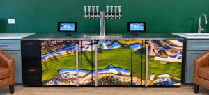 Eight-tap iPourIt self-pour kiosk with two touchscreens and a custom golf-course wrap at Golf Haus.