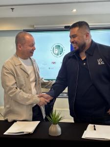 HII CEO Luis Monseratt shaking hands with LOKAL Founder and Principal, Joshua Pielago