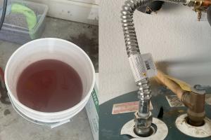 bucket of sediment-rich water after water heater tank flush in dallas tx