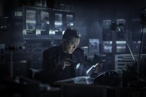 Louis Koo as detective Maximo in Mastermind (2026), a Hong Kong crime thriller in which a murder investigation turns against the detective himself.