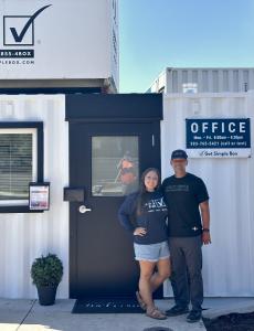 Trevor and Brittney Eshuis outside their local Get Simple Box yard