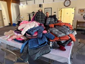 Janae Tanner from Strativera with all the donated coats