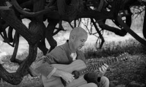 artist image with guitar