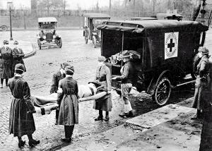 A victim of the 1918 Spanish flu is loaded into an ambulance.