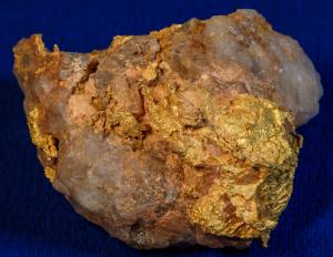 Gold and quartz specimen, a native gold in quartz matrix with 0.75 percent gold content weighing 5.03 troy ounces ($7,320).