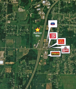 Interstate 77 aerail showing auction site and neighboring hotel, convenience stores and truck stop.