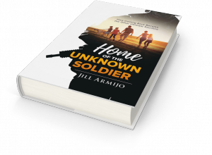 The Book, "Home of the Unknown Soldier," by Jill Armijo, laid down face up on a black surface diagnal to the frame. The cover of the book features the faded outline of a modern soldier carrying an assault rifle, with his mouth and nose where the picture c