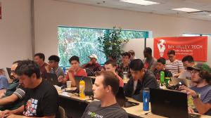 Code academy students in class