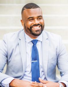 Portrait of Eric Pierre, seated