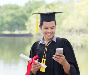 Graduating Senior Watching a RexVid on His Phone