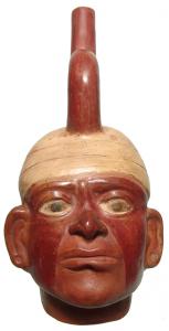 Lovely Moche portrait vessel made between 100 BC and 500 AD, 11 ½ inches tall, depicting a male with well-modeled features and a wrapped headdress (est. $600-$800).