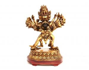 Tibetan gilt bronze tantric Buddhist figures in yab-yum, 14 inches tall by 10 ¾ inches wide by 8 inches deep (est. $400-$600).