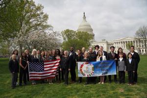 Mary Shuttleworth, President of YHR International with speakers and awardees on the US Capitol grounds following the US National Human Rights Conference