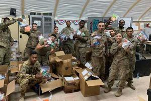 Soldiers with Care Packages from BR Soldier Outreach