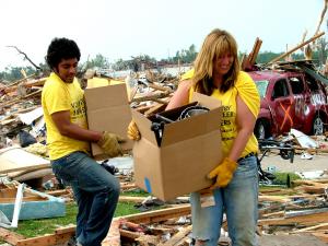 Scientology volunteers cleaning up after a tornado