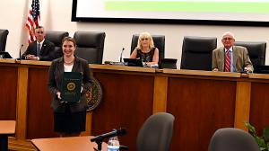 Grace Wheeler accepts the "Not On My Watch Day" proclamation text at the Public Commissioners' Meeting Wednesday, Aug. 12, 2020 in Doylestown.