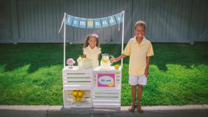 Maxim and Maya, ages 5 and 8, the founders of M&M Lemonade Stand