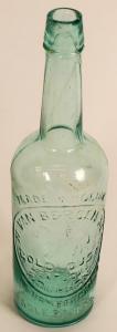 Van Bergen Gold Dust whiskey bottle from 1880 in an ultra-rare aqua color in very near perfect condition, with applied top and light whittle (est. $5,000-$7,500).