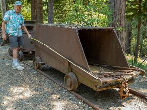 Very large incline ore car used at a major California gold mine (possibly the Miners Foundry in Nevada City), around nine feet long and four feet tall, with ten feet of rail (est. $5,000-$7,000).