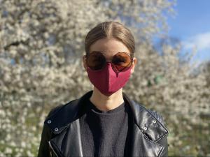 Latvian woman in mask