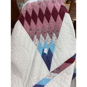 Amish quilt, a perfect accompaniment for the upcoming chilly fall nights, $285.